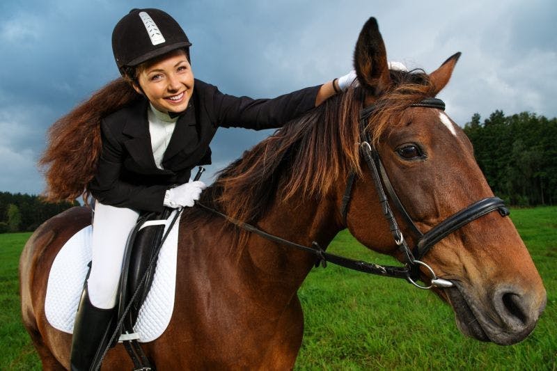 Photo of a girl on horseback