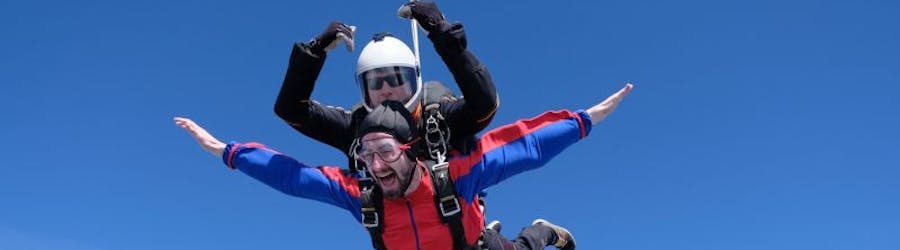 Photo of two men doing a tandem skydive