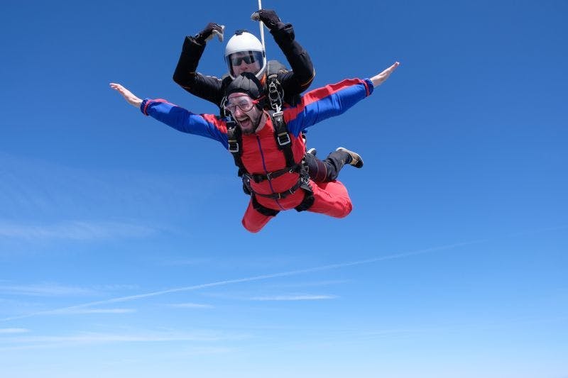 Photo of male tandems skydivers