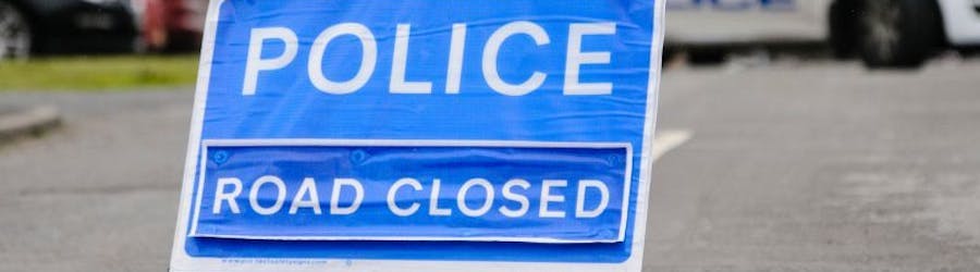 Photo of police road closed sign