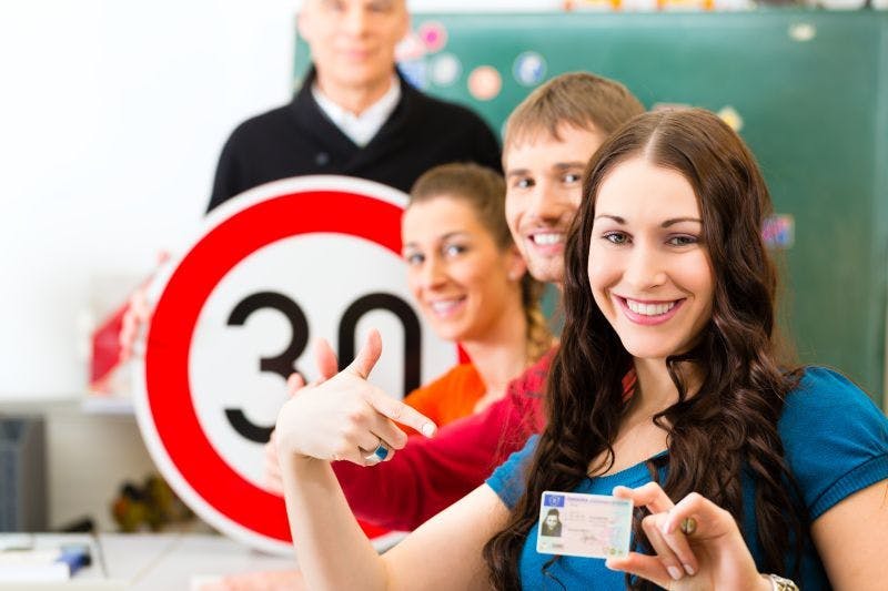 Young learner drivers with their instructor