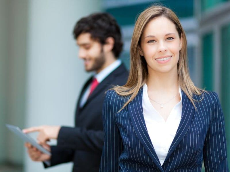 woman with man in background